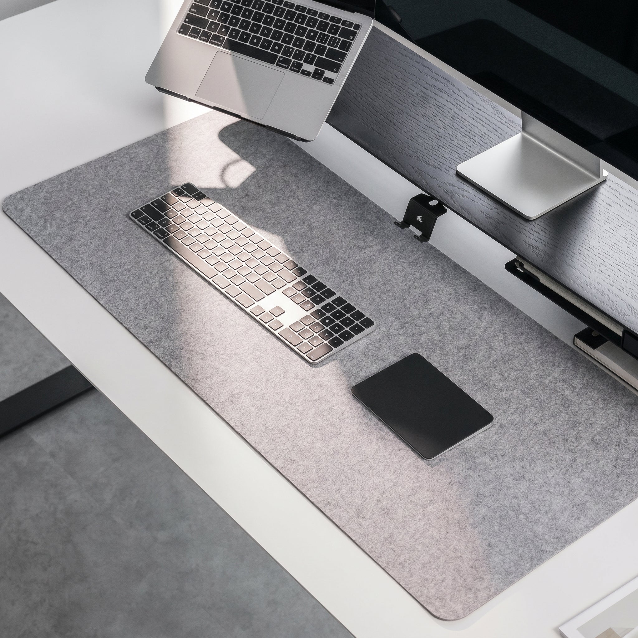 Reversible Felt & Cork Desk Mat in a warm desk setup